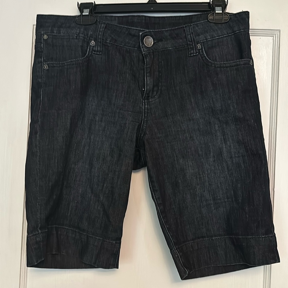 Deep blue jean shorts.